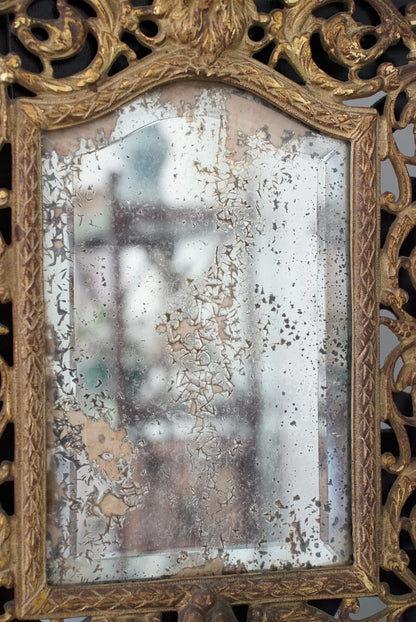 Antique Brass Bacchus Beveled Mirror by Bradley and Hubbard