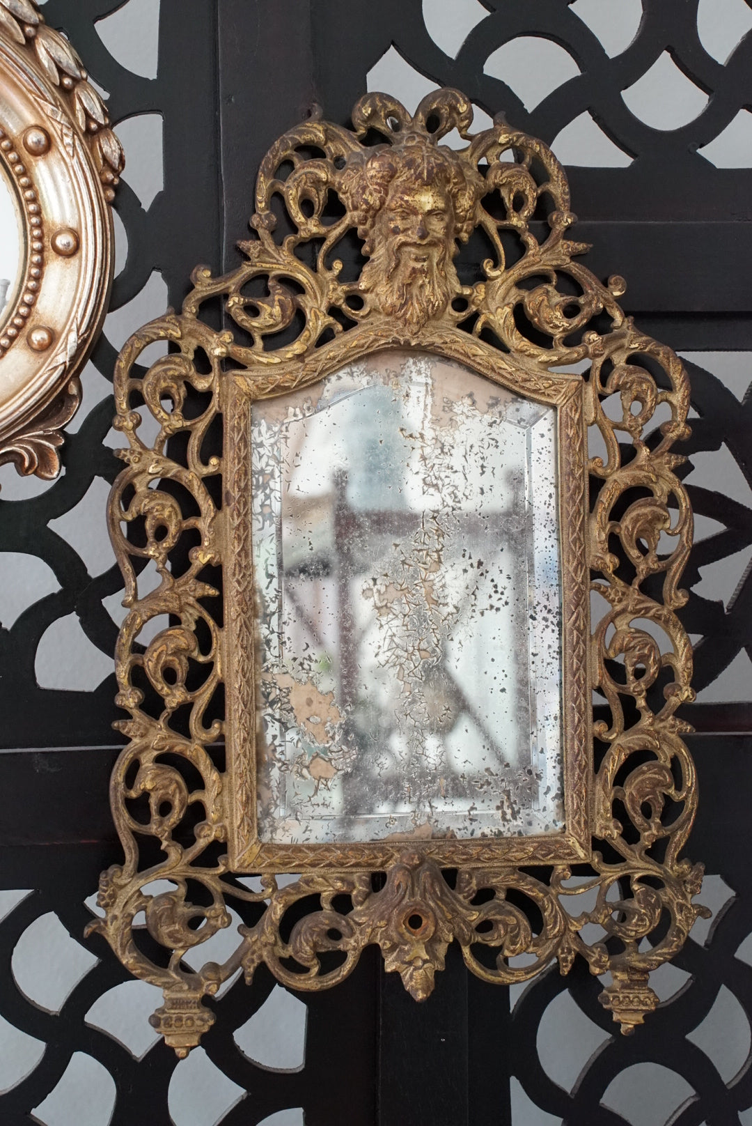 Antique Brass Bacchus Beveled Mirror by Bradley and Hubbard