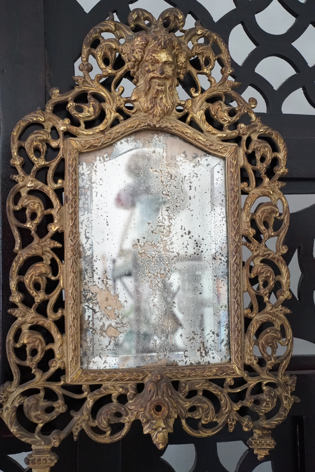Antique Brass Bacchus Beveled Mirror by Bradley and Hubbard