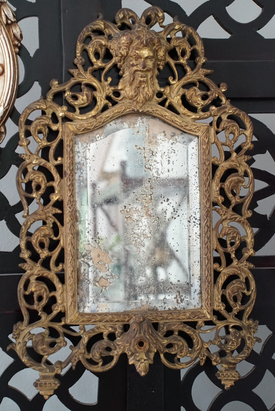 Antique Brass Bacchus Beveled Mirror by Bradley and Hubbard