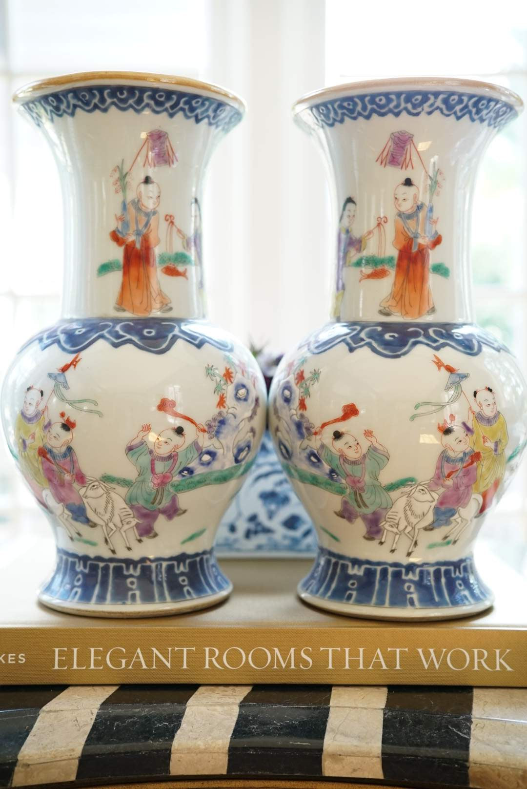 Pair of—Famille Rose Vases with Children at Play Motif