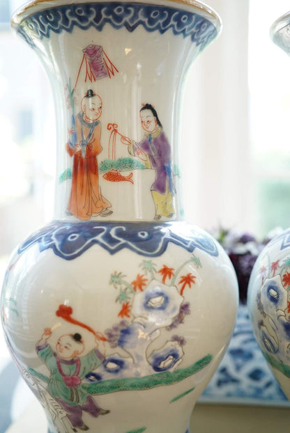 Pair of—Famille Rose Vases with Children at Play Motif