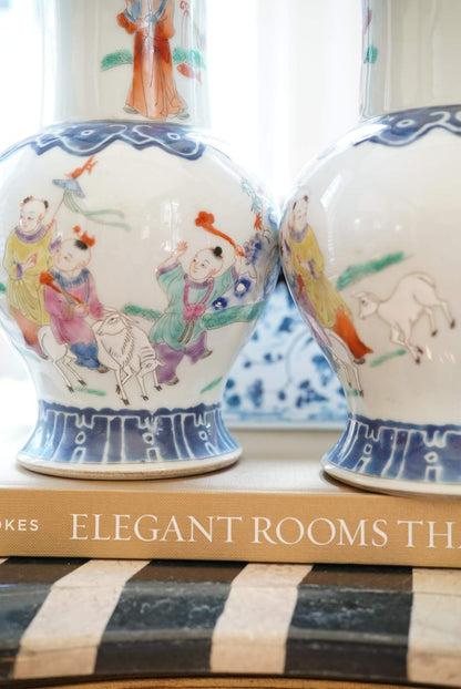 Pair of—Famille Rose Vases with Children at Play Motif